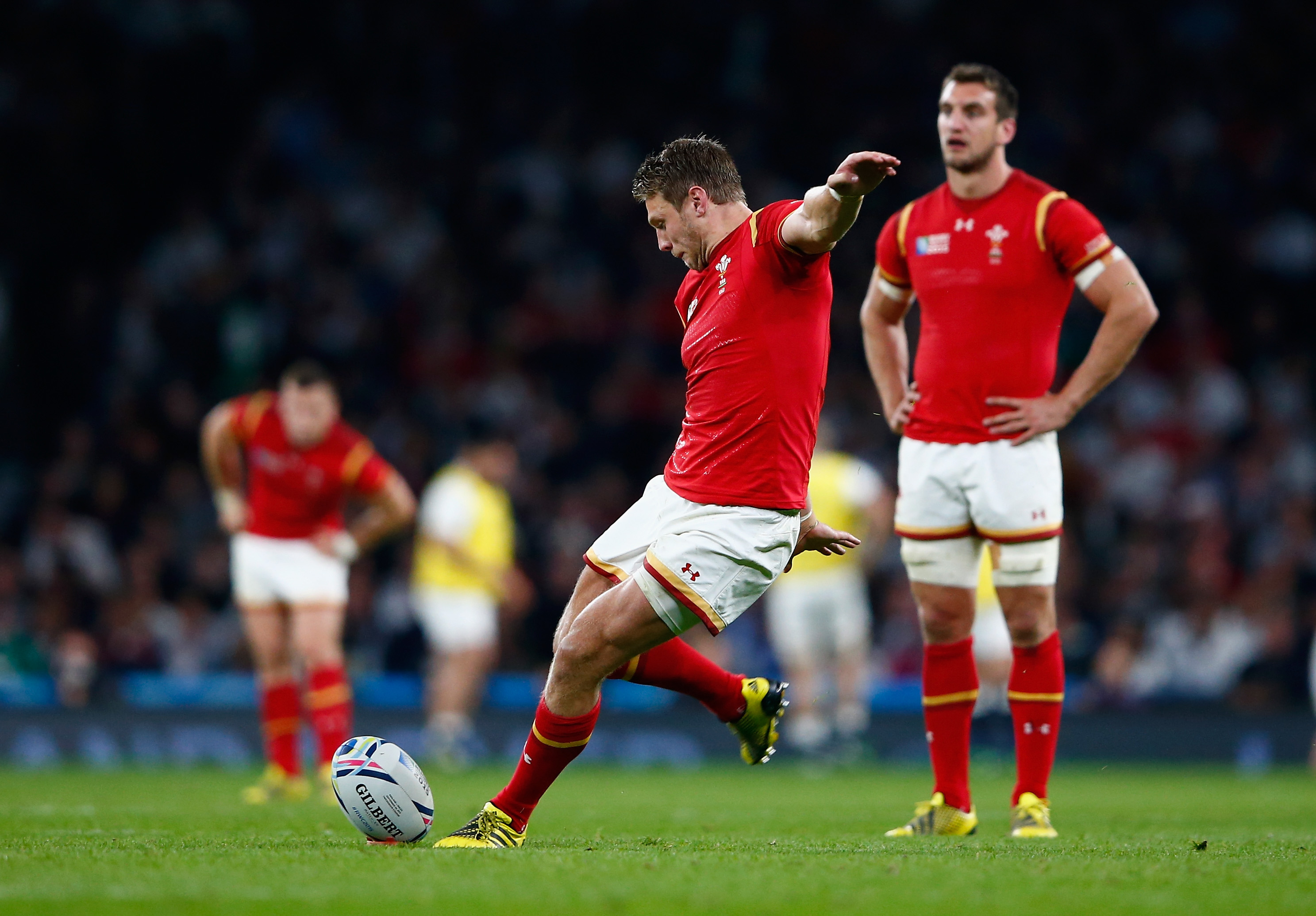 LONDON, ENGLAND - SEPTEMBER 26: Dan Biggar of Wales kicks a penalty during the 2015 Rugby World Cup Pool A match between England and Wales at Twickenham Stadium on September 26, 2015 in London, United Kingdom. (Photo by Shaun Botterill/Getty Images)