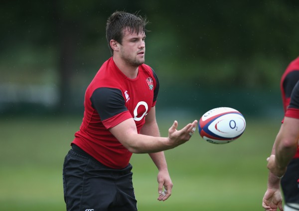 TEDDINGTON, ENGLAND - MAY 29: Jack Clifford passes the ball during the England training session held at the Lensbury Club on May 29, 2015 in Teddington, England. (Photo by David Rogers/Getty Images)