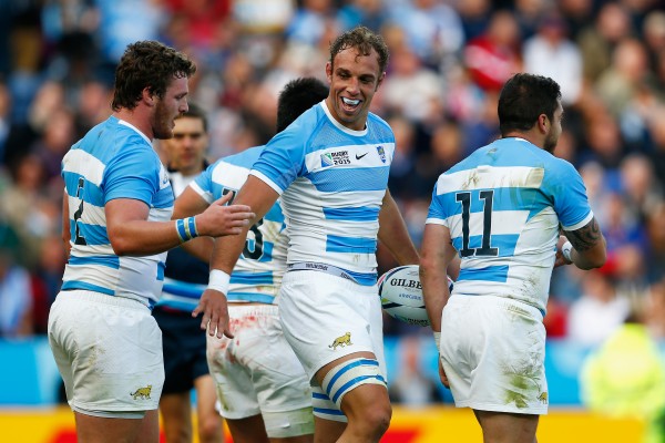 LEICESTER, ENGLAND - OCTOBER 11: Leonardo Senatore of Argentina (C) celebrates with teammates after scoring a try during the 2015 Rugby World Cup Pool C match between Argentina and Namibia at Leicester City Stadium on October 11, 2015 in Leicester, United Kingdom. (Photo by Harry Engels/Getty Images)