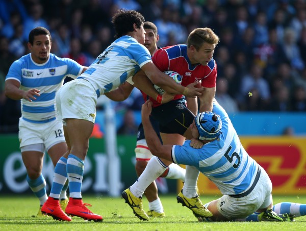 LEICESTER, ENGLAND - OCTOBER 11 : Johan Deysel of Namibia is tackles by Matias Alemanno and Matias Moroni of Argentina during the 2015 Rugby World Cup Pool C match between Argentina and Namibia at Leicester City Stadium on October 11, 2015 in Leicester, United Kingdom. (Photo by Mark Runnacles/Getty Images)