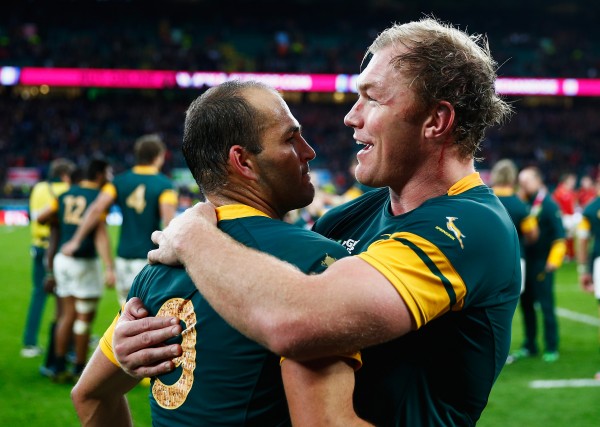 LONDON, ENGLAND - OCTOBER 17: a jubilant Schalk Burger of South Africa (R) and Fourie Du Preez of South Africa enbrace following victory in the 2015 Rugby World Cup Quarter Final match between South Africa and Wales at Twickenham Stadium on October 17, 2015 in London, United Kingdom. (Photo by Chris Lee - World Rugby/World Rugby via Getty Images)