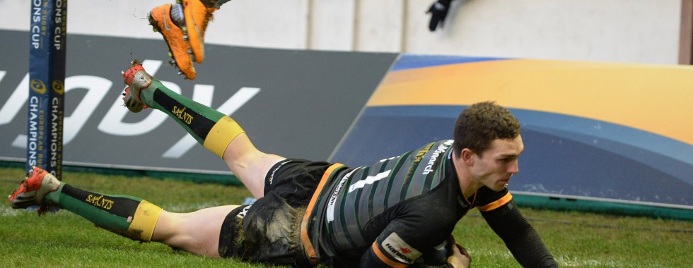 NORTHAMPTON, ENGLAND - JANUARY 24: George North of Northampton Saints dives in to score a try during the European Rugby Champions Cup match between Northampton Saints and Racing Metro 92 at Franklin's Gardens on January 24, 2015 in Northampton, England. (Photo by Tony Marshall/Getty Images)