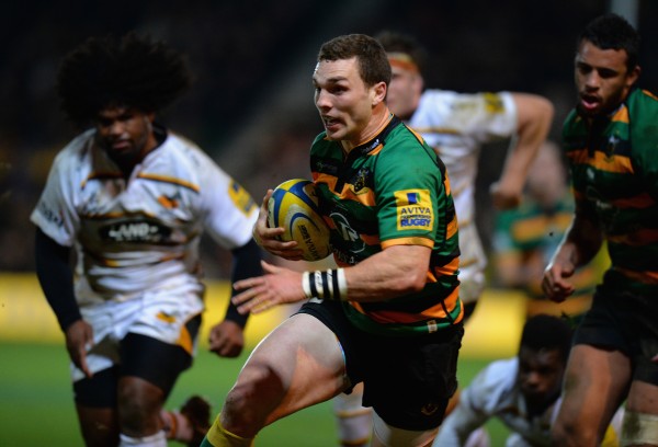 NORTHAMPTON, ENGLAND - MARCH 27: George North of Northampton Saints breaks through for the try line during the Aviva Premiership match between Northampton Saints and Wasps at Franklin's Gardens on March 27, 2015 in Northampton, England. (Photo by Tony Marshall/Getty Images)